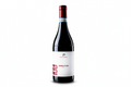 Red wine bottle with a white label on a black background
